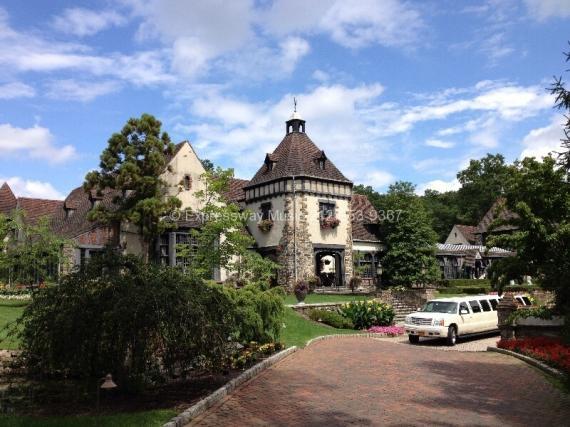 Front view of Pleasantdale Chateau with Limo