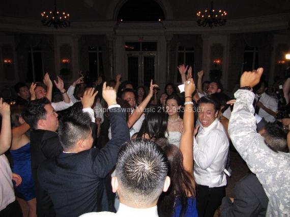 Dancing at NJ Wedding with hands in air