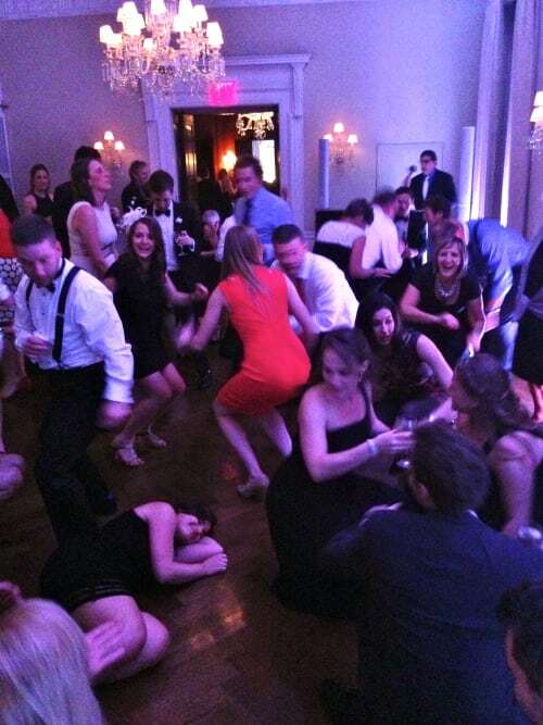 Wedding guests getting down on the dance floor at the Harold Pratt House
