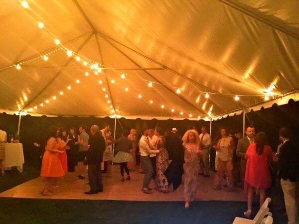 Westchester Wedding guests Dancing under Tent south salem ny lakefront