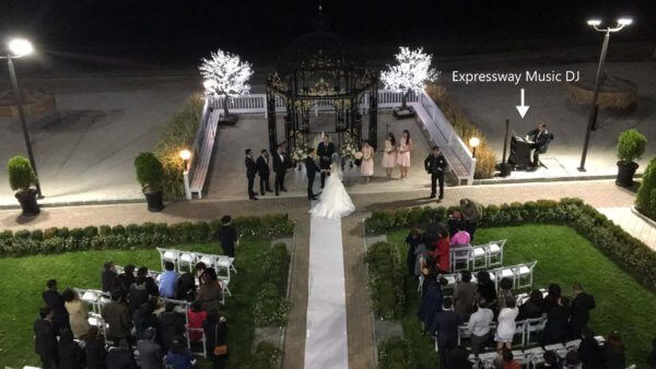 Balcony view of wedding ceremony facing the ocean at the Surf club in Westchester NY