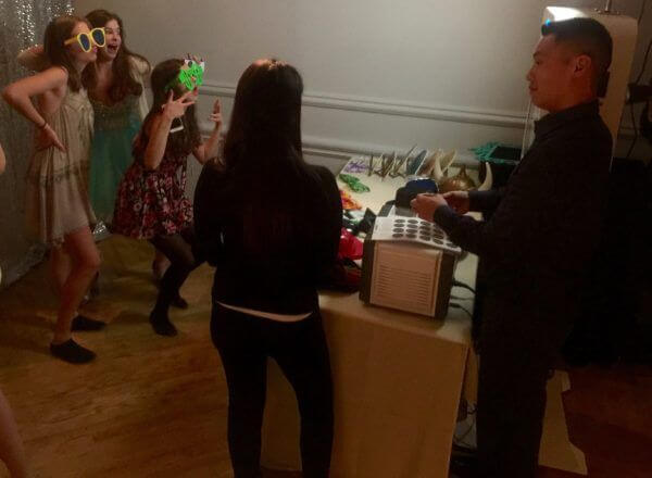 Bat Mitzvah guests having fun with Expressway Music Photo Booth