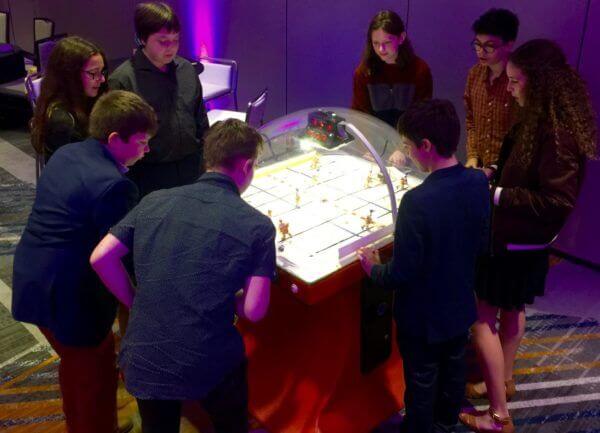 guests playing dome hockey at Brooklyn Mitzvah