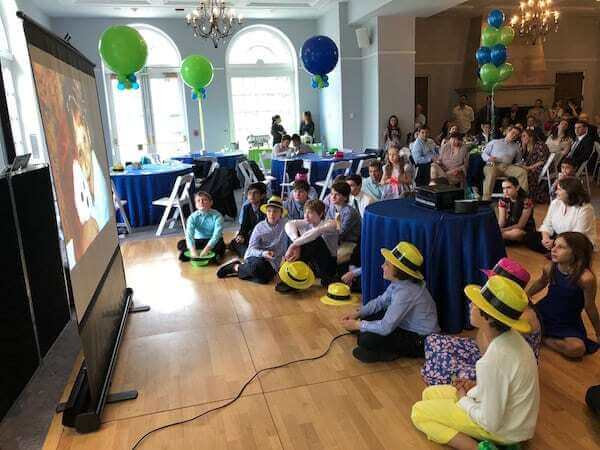 Guests watching Montage on dance floor