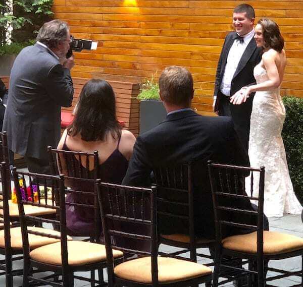 Photographer shoots Bride and Groom on Rooftop NYC