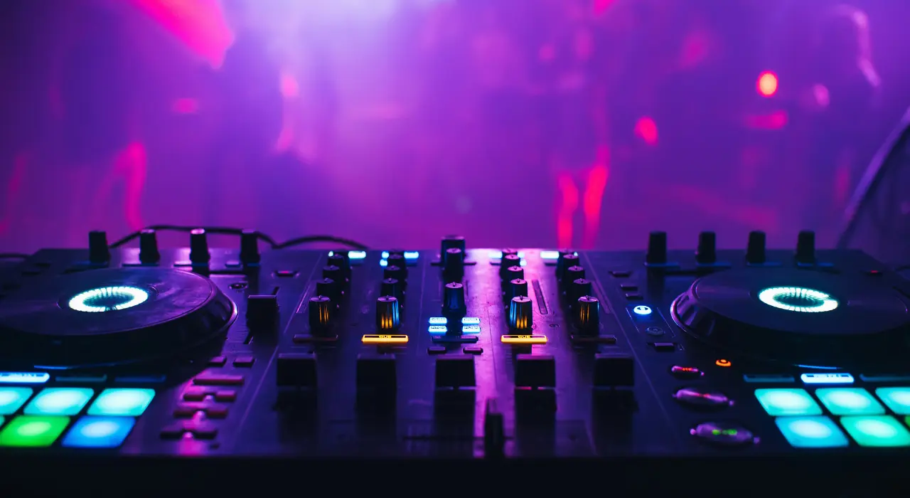 DJ decks lit up during a party