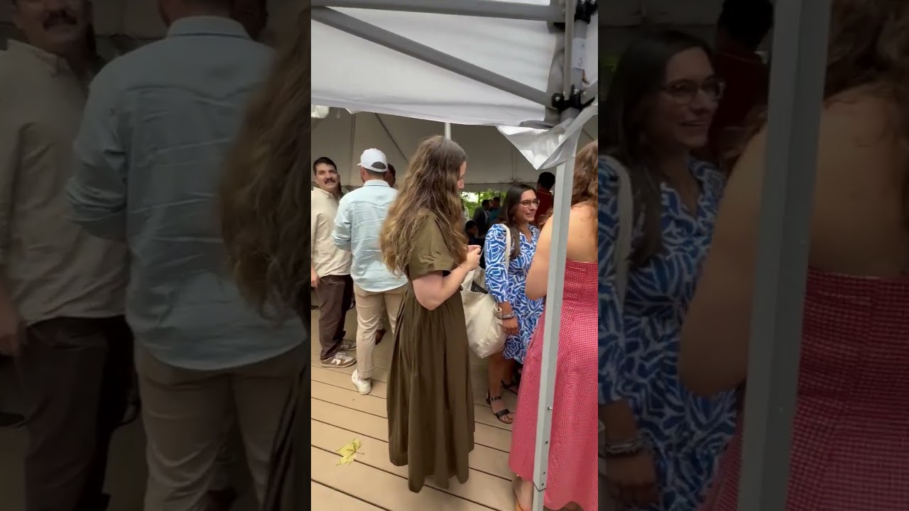 DJ Dave Swirsky waving hello at Wedding Cocktail hour
