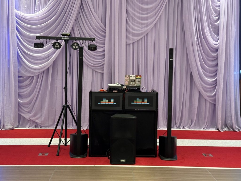 A professional wedding DJ and MC setup at a NYC venue