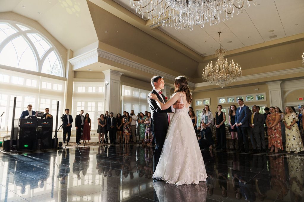 A couple dancing with the DJ at a New York wedding venue
