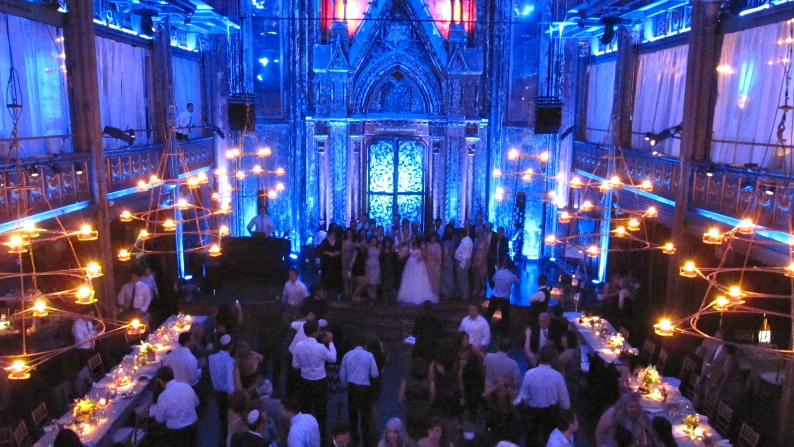 Wedding reception under blue lighting at the Angel Orensanz Center
