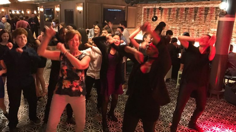 Guests dancing at a bar mitzvah at the Fishbowl in the Dream Hotel