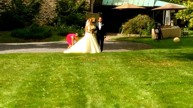 Bride and groom on the lawn at Shadow Lawn